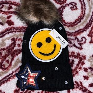 Girls black knit hat with designs. OS